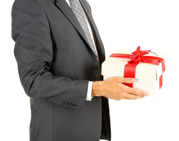 Young businessman present gift box, isolated on white - Foto, Imagen