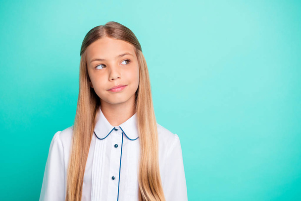 Close-up portrait of nice-looking attractive lovely winsome charming pensive curious smart clever pre-teen girl isolated on bright vivid shine blue green turquoise background - Фото, зображення
