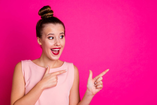 Portrait of cheerful lady feel rejoice content advertise promo choose choice decide decision laugh dressed top-knot fashionable glamorous isolated pink colorful bright background - Foto, Bild