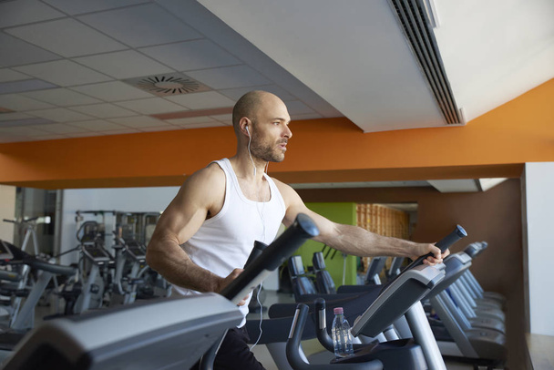 Man doing cardio training on treadmill  - Photo, image