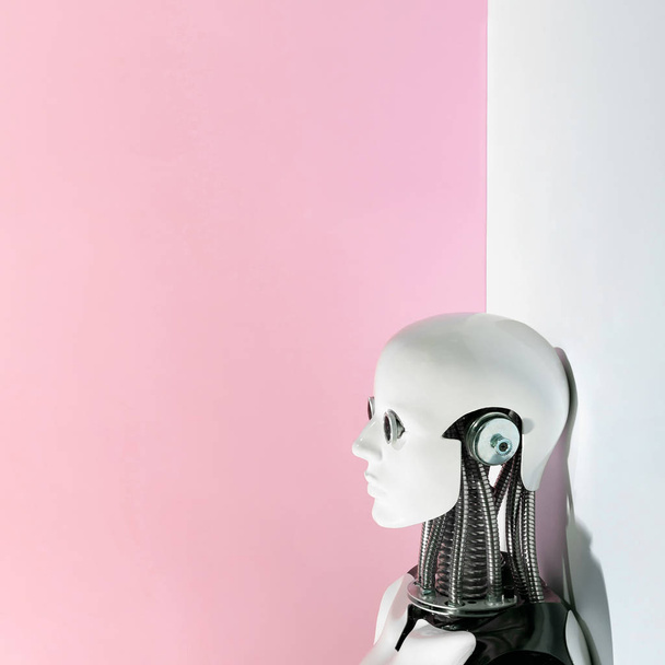 Robot head on abstract pink and white background - Fotografie, Obrázek
