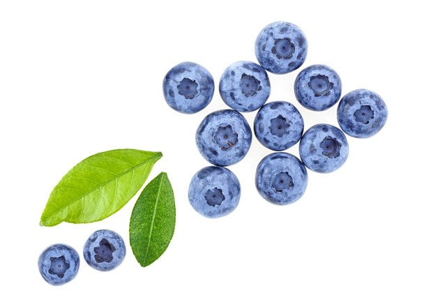 Blueberries with leaves on a white background, top view. - Photo, Image