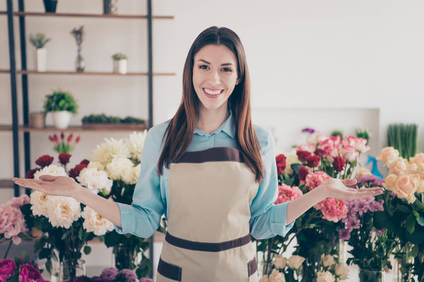 Portrait of attractive nice small self-employed person have scales advertise botany botanical workplace offer choice decision wear trendy stylish beautiful blue shirt peony glasshouse - Foto, Imagen