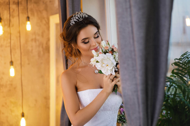 Young happy bride wearing beautiful lush dress  - Фото, изображение