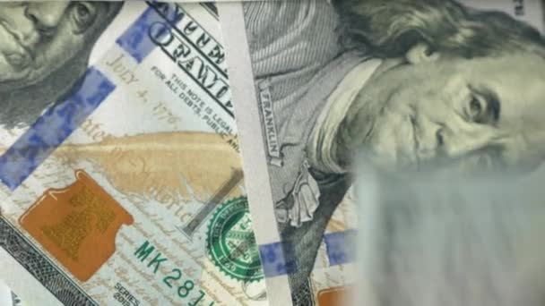 One hundred dollar bills chaotically fall. Closeup shot - Filmati, video