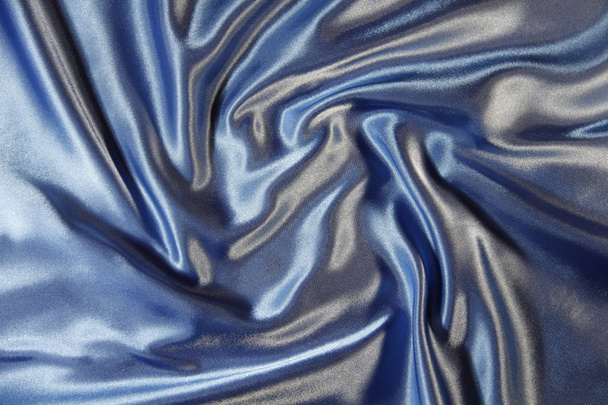 абстракция из смятой голубой ткани
 - Фото, изображение