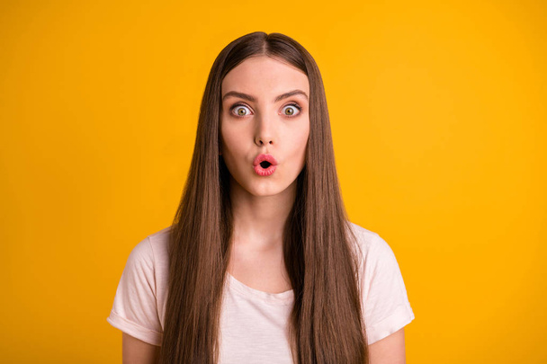Portrait of nice cute sweet millennial astonished listen hear incredible news promotion anxiety weekend free time rest wear modern youth clothing isolated yellow background - Foto, immagini