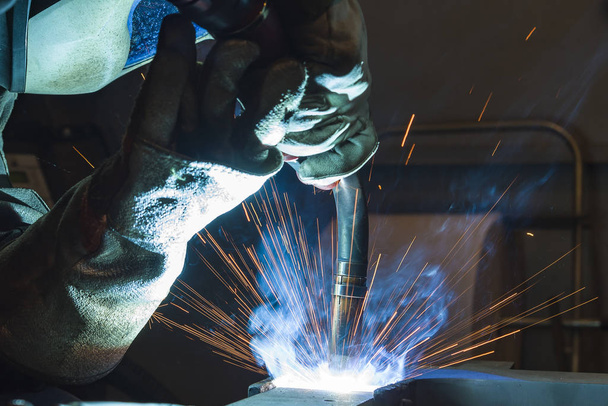 Industrial steel welder in factory welder, craftsman - Fotoğraf, Görsel
