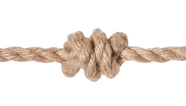 Двойной узел перевязан на джутовой веревке
 - Фото, изображение