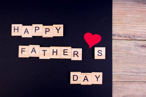 Happy Fathers day on wooden background. symbols of love, father, man. happy Valentines day background. copy space for inscription. - 写真・画像