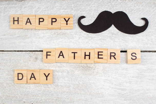 Happy Fathers day on wooden background. symbols of love, father, man. happy Valentines day background. copy space for inscription. - Foto, Imagen