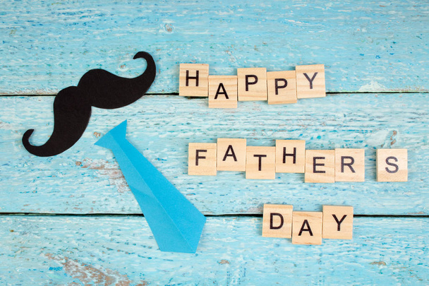 Happy Fathers day on wooden background. symbols of love, father, man. happy Valentines day background. copy space for inscription. - Zdjęcie, obraz