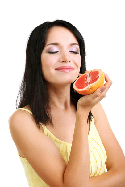 Girl with fresh grapefruit isolated on white - Фото, изображение