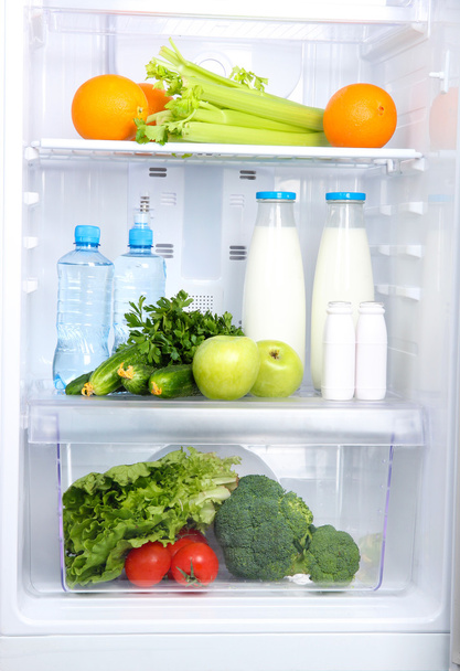 Open refrigerator with vegetarian food - Фото, изображение