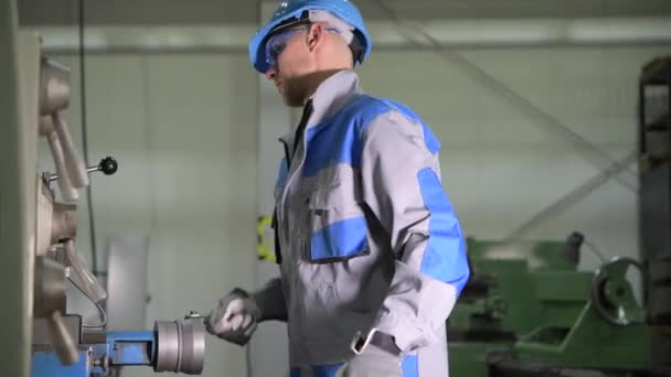 Caucasian Metal Lathe Operator in His 30s During Metal Processing Work. - Footage, Video