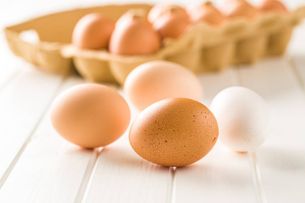 Raw chicken eggs. - Фото, изображение