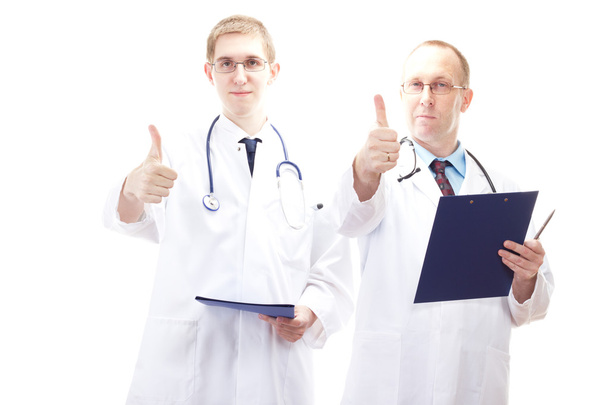 zwei männliche Ärzte zeigen Daumen hoch - Foto, Bild