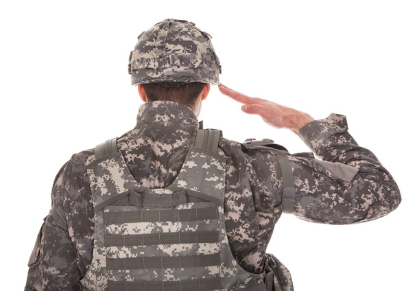 Portrait Of Man In Military Uniform Saluting - Zdjęcie, obraz