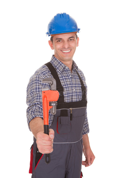 Portrait Of A Male Worker Holding Worktool - Photo, image