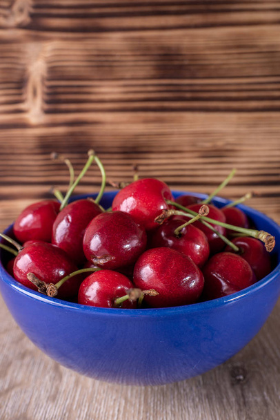 red cherries in the background - Фото, изображение