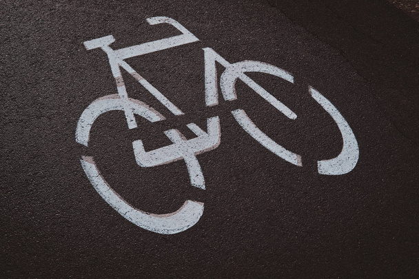 Asphalt road for cyclists, market with special white sign. - Photo, Image