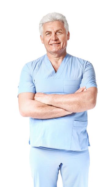 Portrait of mature physiotherapist on white background - Foto, Bild