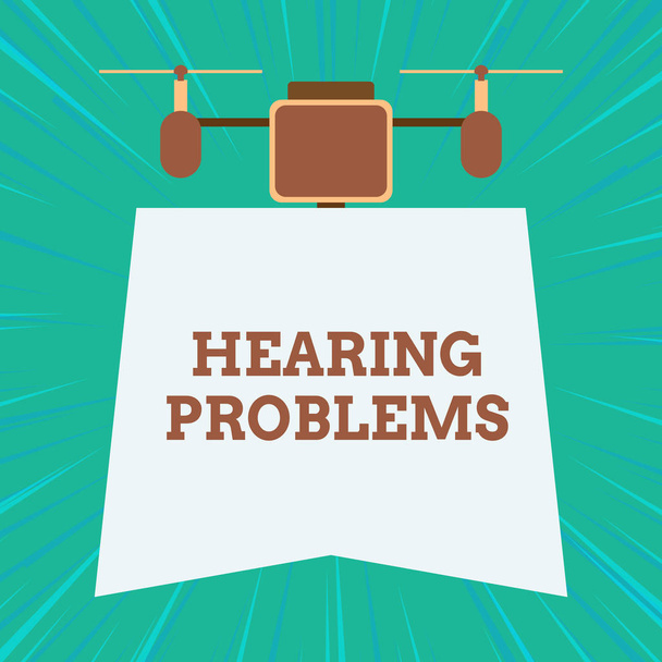 Text sign showing Hearing Problems. Conceptual photo is partial or total inability tolisten to sounds normally Drone holding downwards banner. Geometrical abstract background design. - Fotoğraf, Görsel