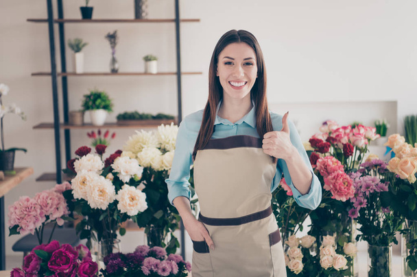Portarit of positive cheerful people assistant feedback choose decide choice decision her she orangery ads floral entrepreneur  concept wear blue shirt trendy stylish beautiful indoors - Photo, image