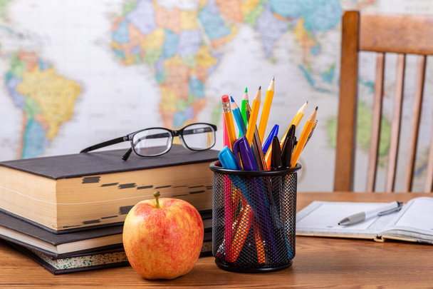 School Teachers Desk With World Map in Background - Foto, Imagem