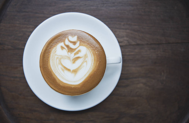 latte vagy Cappuccino, habos hab, kávé csésze felülnézet - Fotó, kép