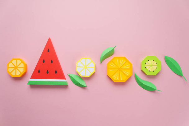 Fruit made of paper. Pink background. There's room for writing. Tropics. Flat lay. - Foto, Bild
