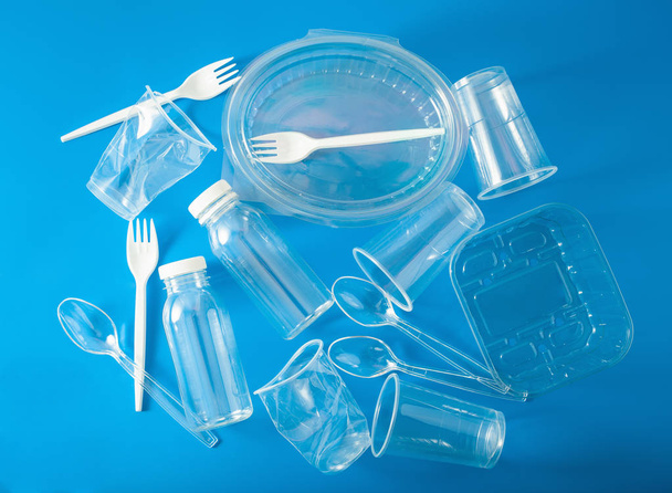 single use plastic bottles, cups, forks, spoons. concept of recy - Photo, Image