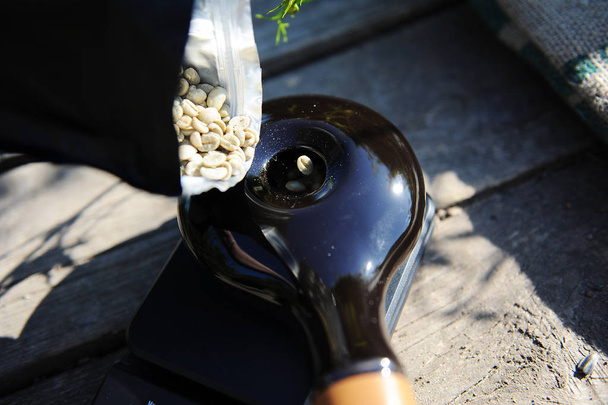 Eco black ceramic handy coffee been roaster - Photo, Image