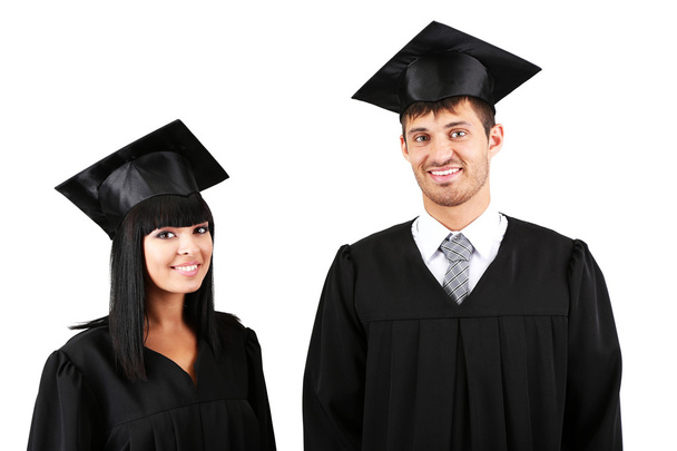 Two happy graduating students isolated on white - Фото, изображение