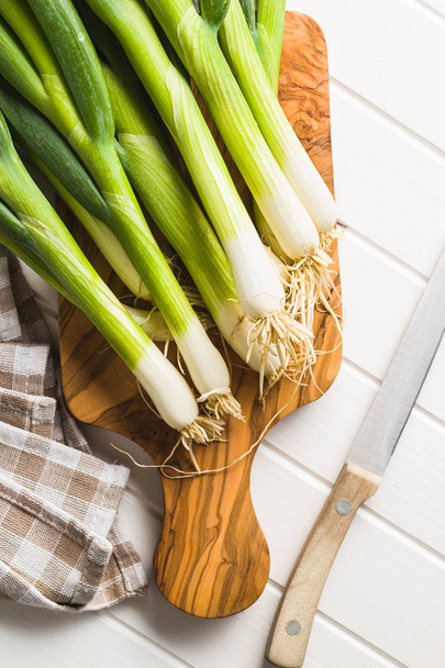 Green spring onions. - Фото, изображение