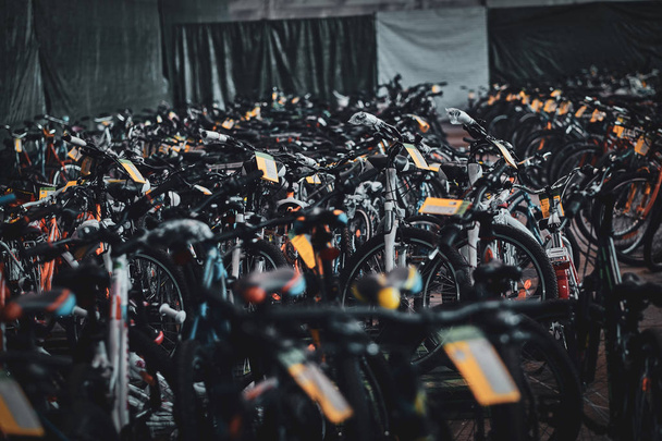 A lot of new bicycles at new warehouse. - Фото, зображення
