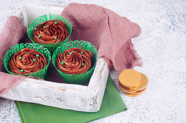 St. Patricks Day chocolate cupcakes with green sugar sprinkles w - Photo, Image