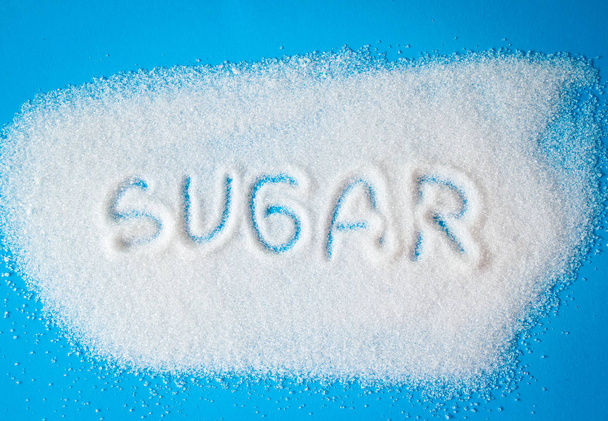 white sugar sand on blue background  - Photo, Image