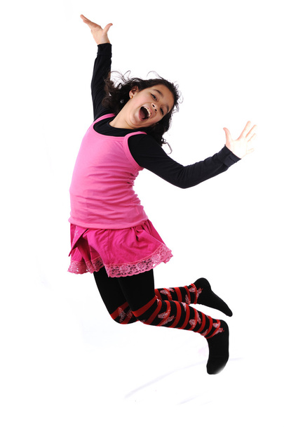roztomilé dítě skákat přes bílé pozadí愛らしい子供以上ジャンプ ホワイト バック グラウンド - Fotografie, Obrázek