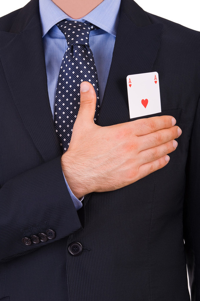 Empresario tomando juramento con tarjeta de as en el bolsillo
. - Foto, imagen