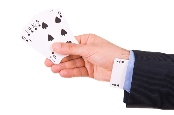 Businessman with ace card hidden under sleeve. - Foto, Imagem
