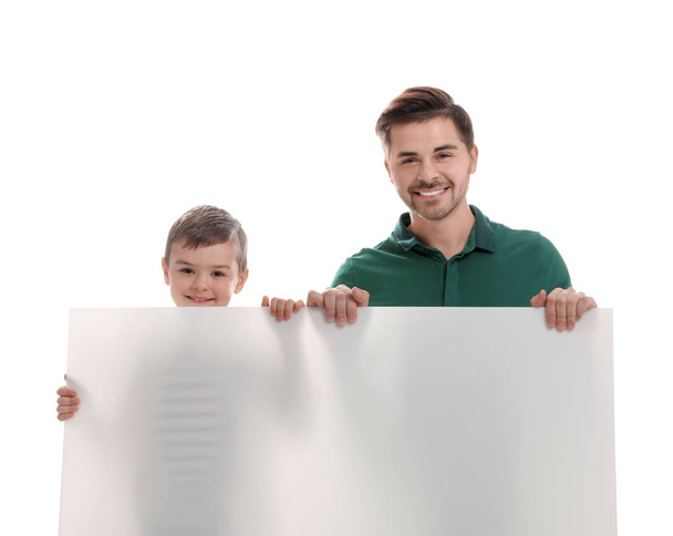 Dad and his son with empty banner isolated on white. Space for design - Φωτογραφία, εικόνα