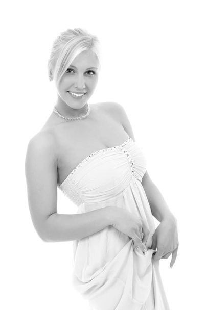 beautiful smiling girl in a light dress - Фото, изображение