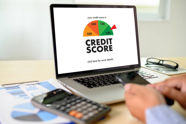 CREDIT SCORE (Businessman Checking Credit Score Online and Finan - 写真・画像