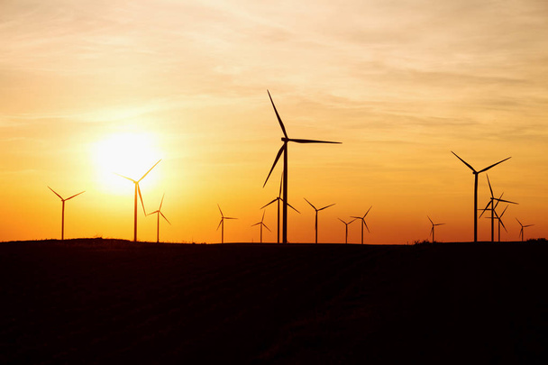 Wind Turbines Over Sunset Sky Generating Electricity - Zdjęcie, obraz