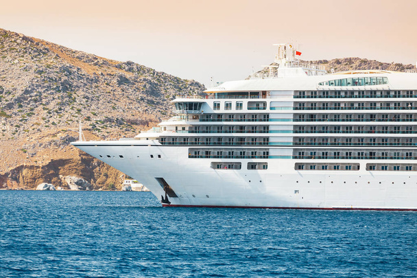 Big cruise ship in the sea harbor. Travel vacation and water transport concept - Photo, Image