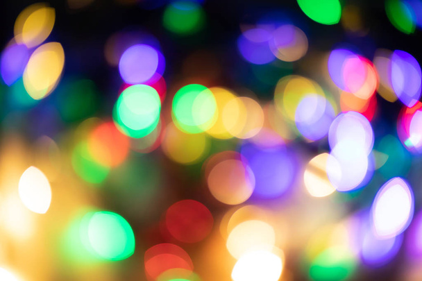 абстрактні шпалери, барвисті боке світло в темряві
 - Фото, зображення