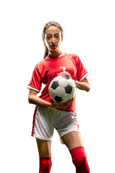 Izolovaná ženská fotbalová hráčka na bílém pozadí. Dívka s fotbalovým míčkem - Fotografie, Obrázek