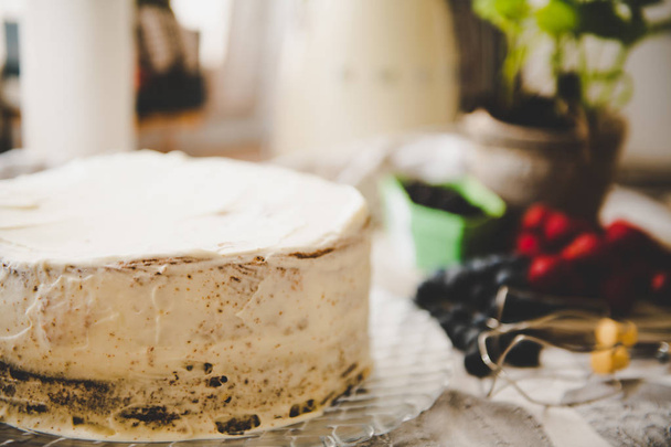beautiful white cream cheese cake with different summer berries  - Foto, imagen