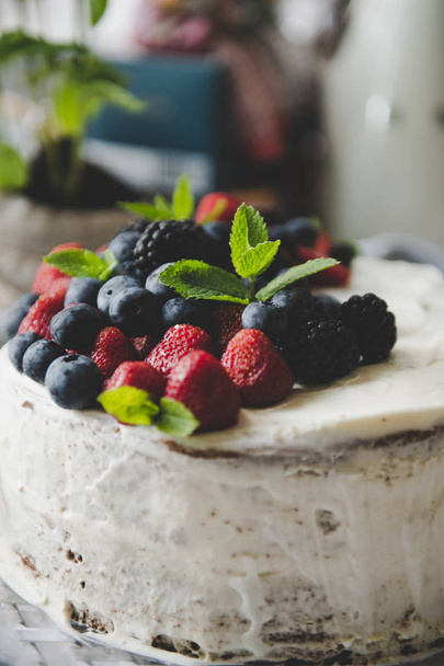 beautiful white cream cheese cake with different summer berries  - Photo, Image